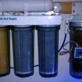 This sediment filter is discolored but hasen't been spent because PSI hasen't been limited.  
The stage on the far right, the DI resin, is spent....one, because of its color....two, because a two part TDS meter tells me that entering TDS remains in large